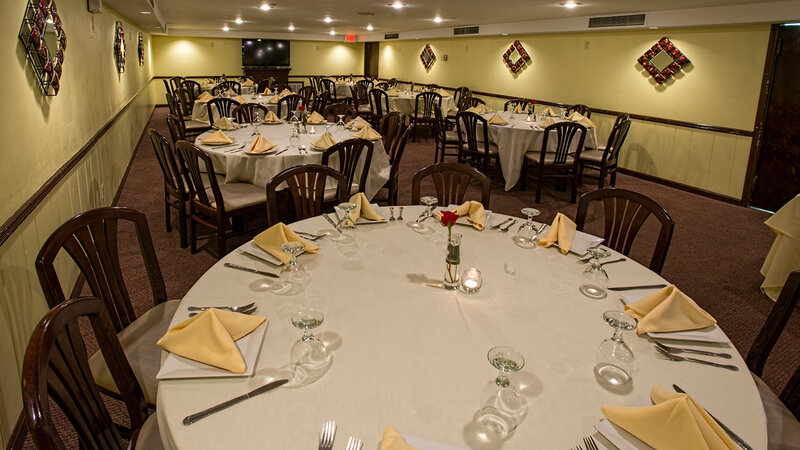 Private party room with many set tables